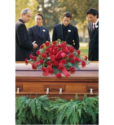 Red Regards Carnations Casket Spray