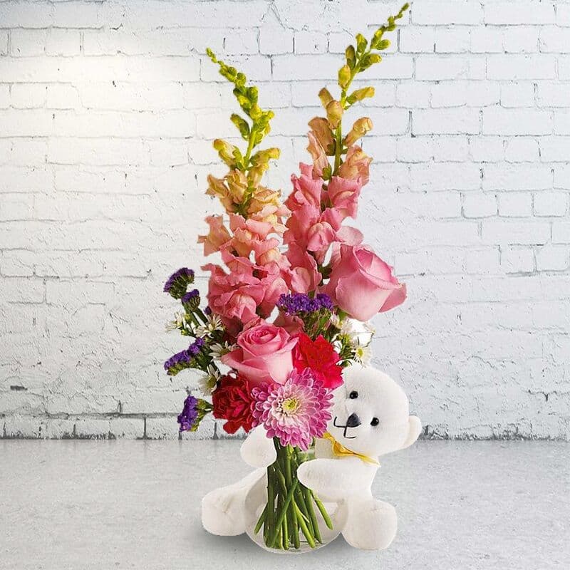 Bear Hug Flower in a Vase with Pink Roses