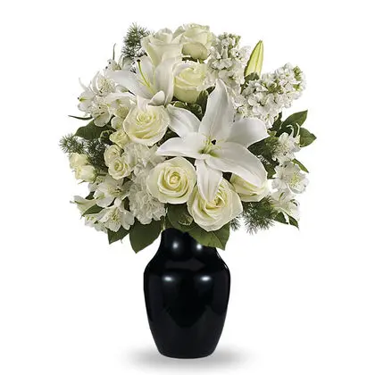 White Flower Arrangement in a Black Vase