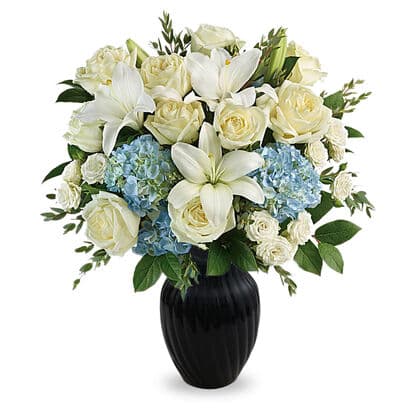Arriving in Style Arrangement in Black Vase