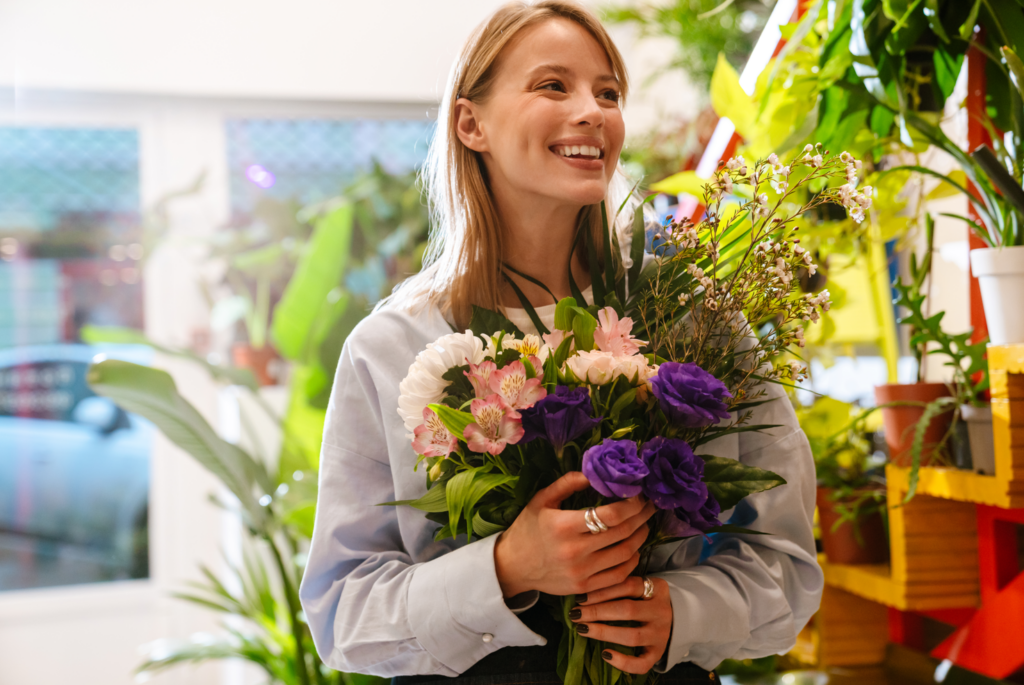 woman holding flower bouquet