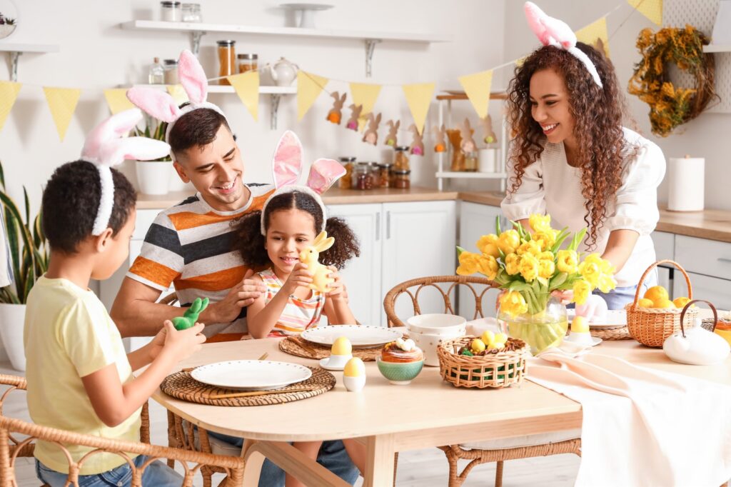 family celebrating Easter flowers