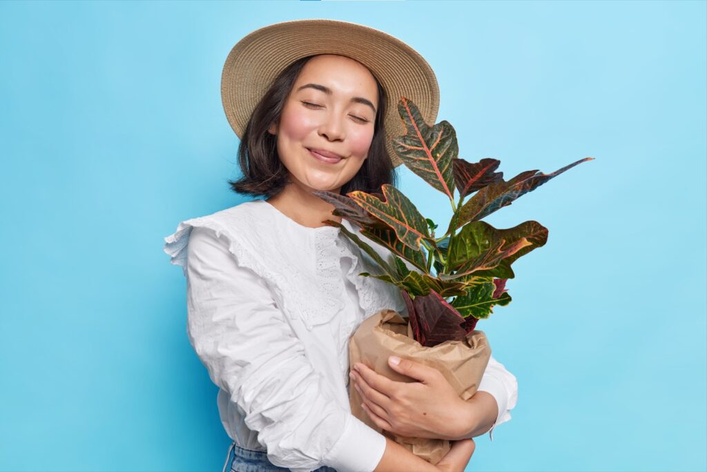 woman happy plant
