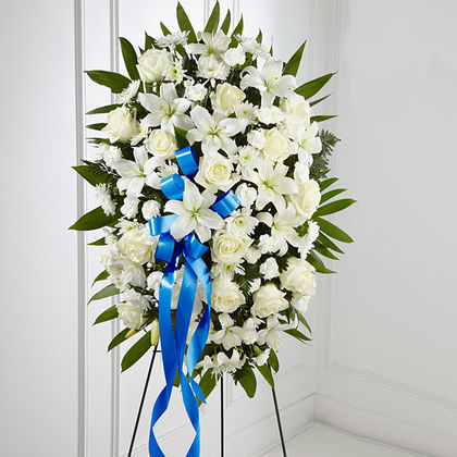The FTD Exquisite Tribute Standing Spray-Blue Ribbon